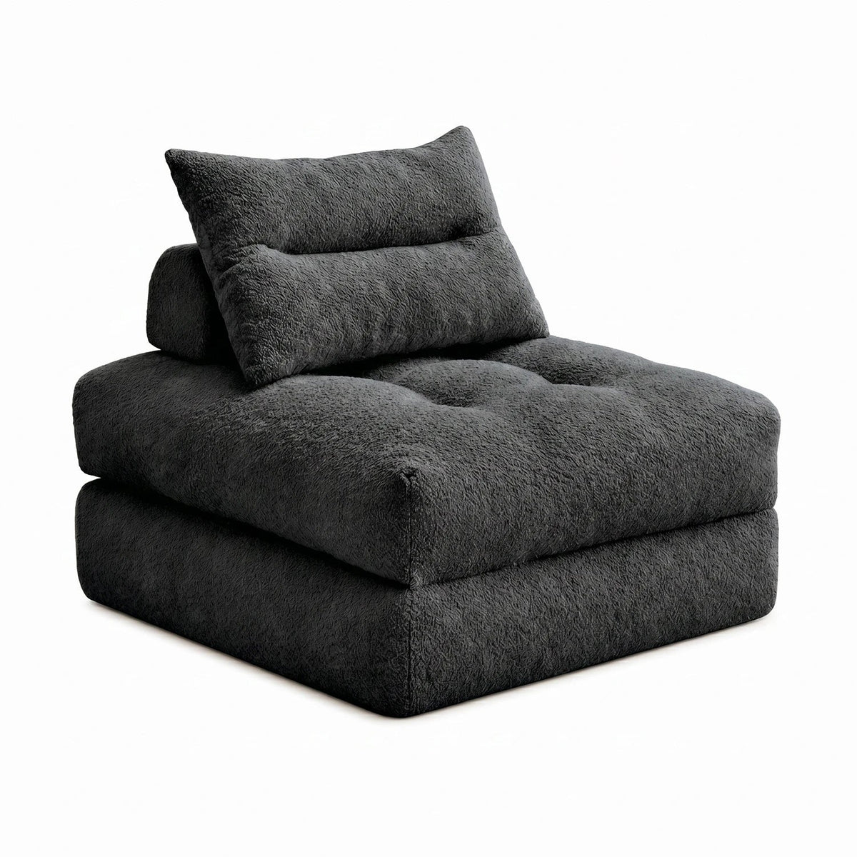 Black Monvane fold-out sofa bed in its folded state with two loose pillows on a white background.