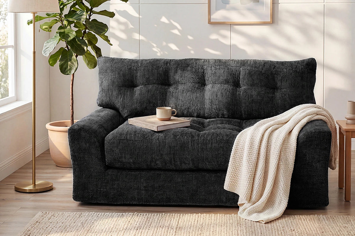 Side Angle View of Monvane Black Chenille Loveseat Showing Deep Seat and Side Pocket