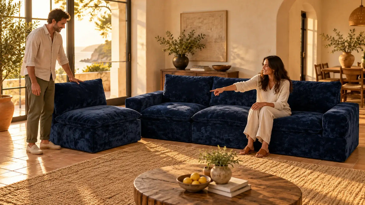 Hands rearranging modular sofa modules into a new living room layout