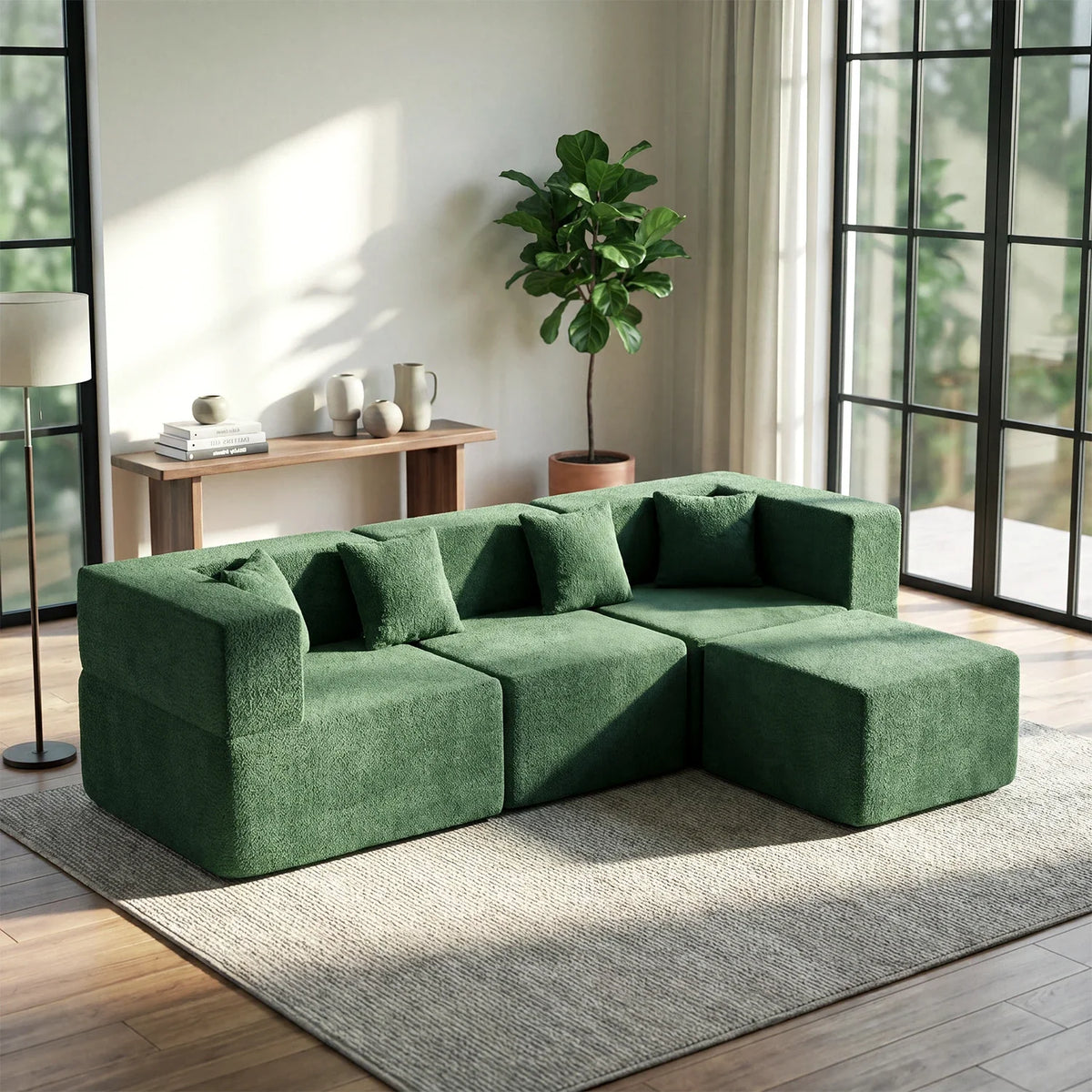Green modular sectional with visible boundaries between upholstered seating sections in a living room.