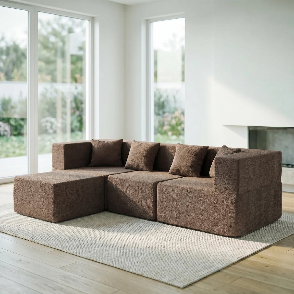 Brown Monvane modular couch with visible boundaries between upholstered units.