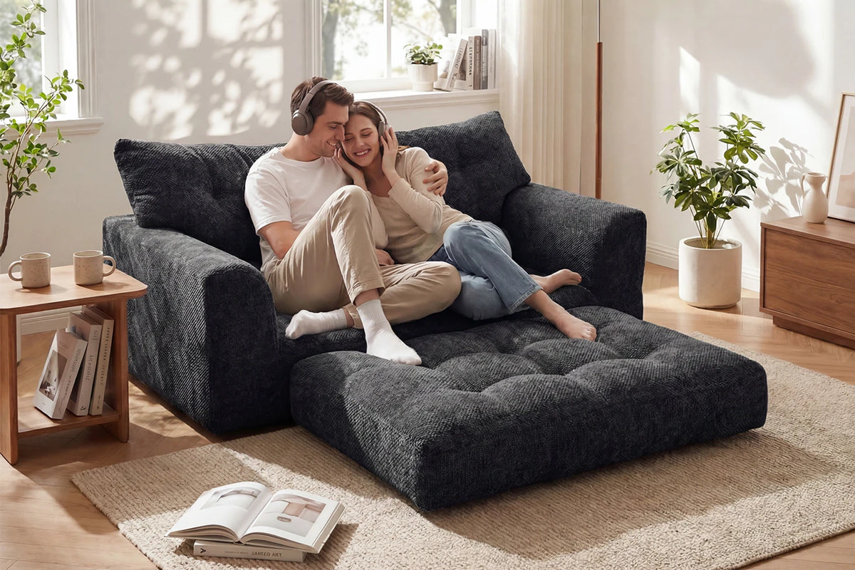Couple Lounging on Monvane Black 2-in-1 Convertible Chenille Loveseat and Floor Lounger